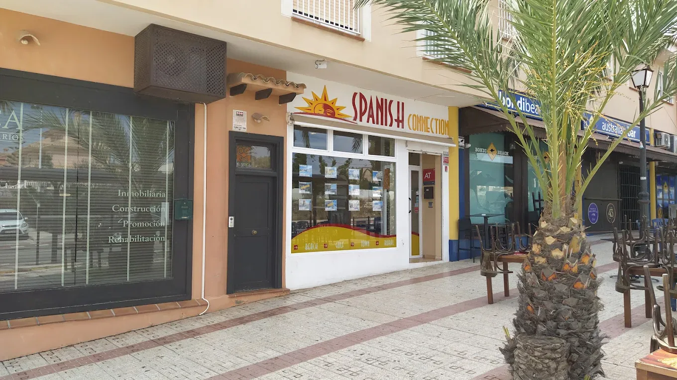 Exterior and window display of The Spanish Connection office in Cabo de Palos