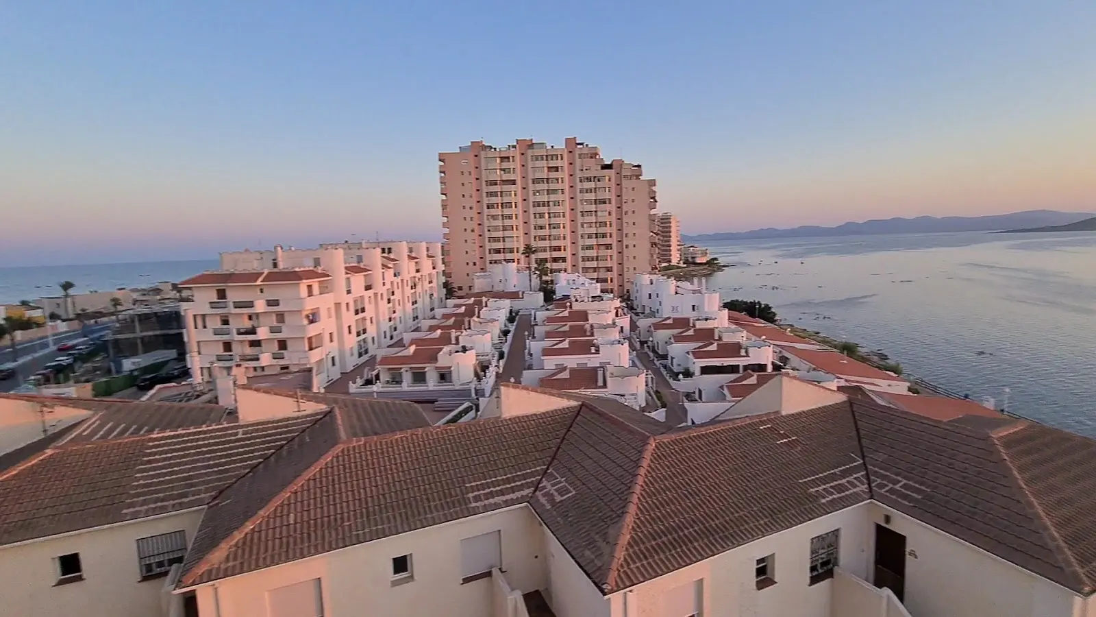Aerial view at sunset of the Apartamentos Vistamar buildings between Mar Menor and Mediterráneo