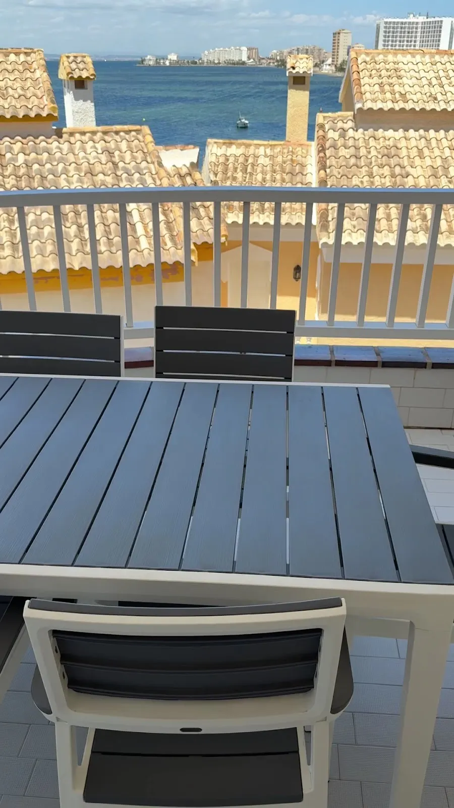 Terrace with views of rooftops and Mar Menor at Apartment Pola Cabo Romano