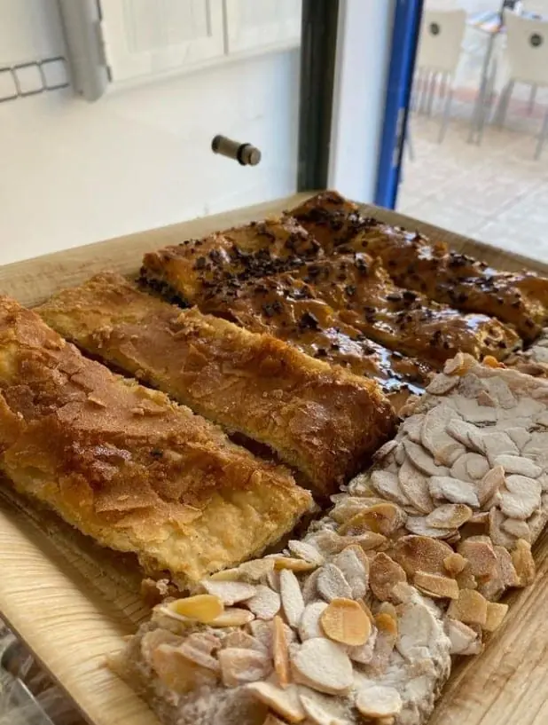 Tray of freshly baked artisan pastries at Café de Levante