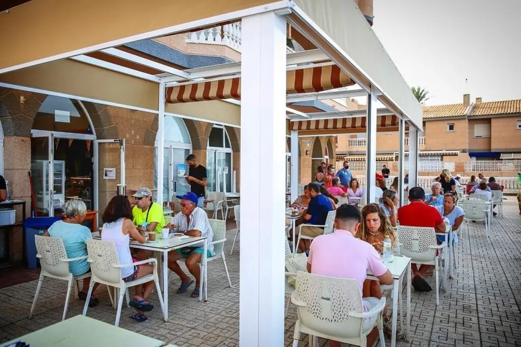 Café Royal terrace full of customers in La Manga