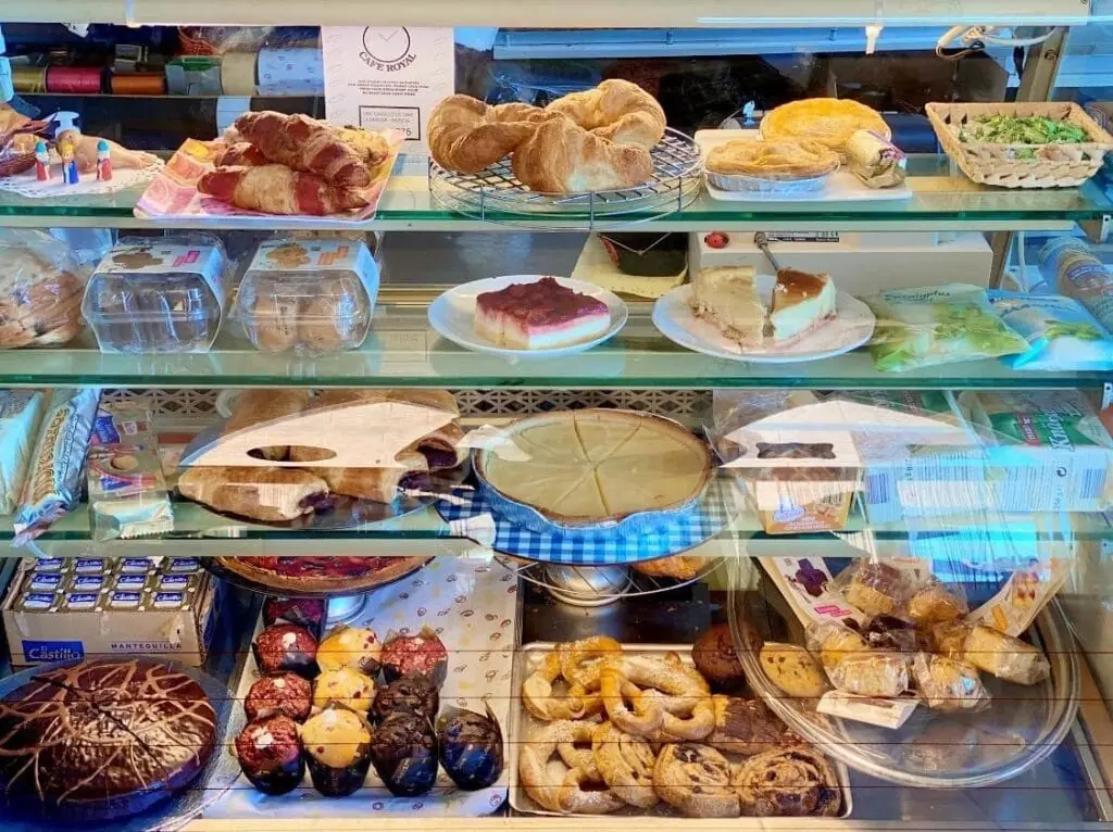 Pastry and cake display at Café Royal, a German bakery