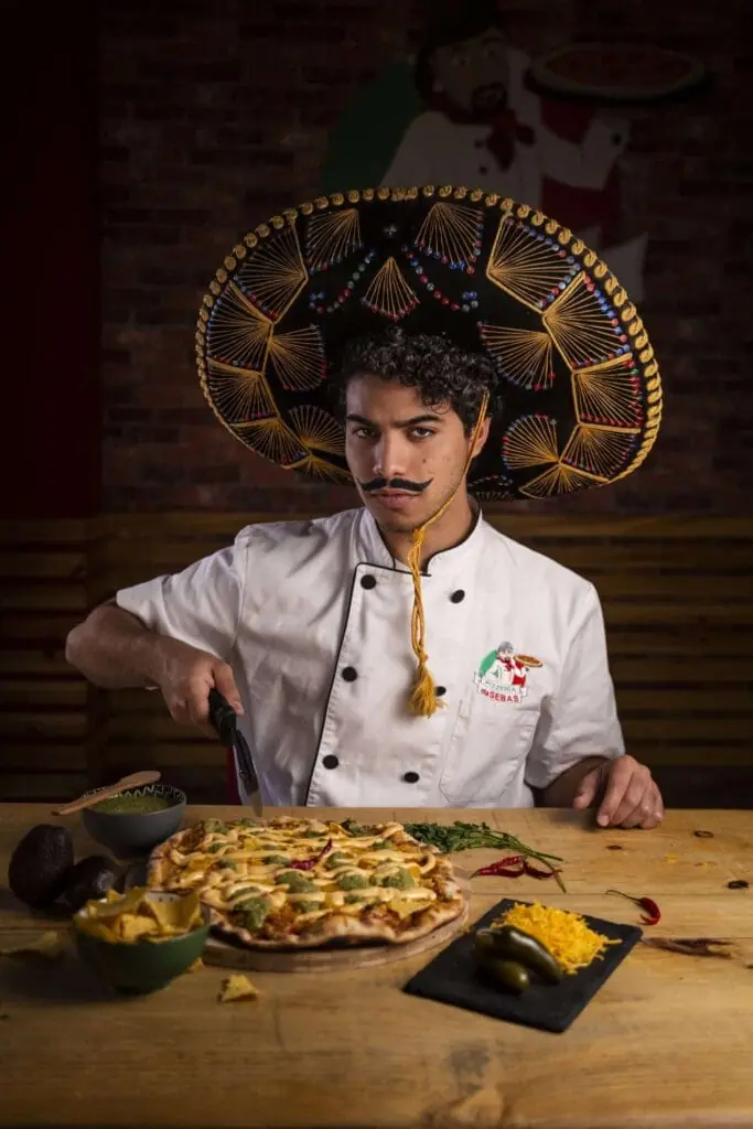 Chef at Dasebas Urban Food making pizza