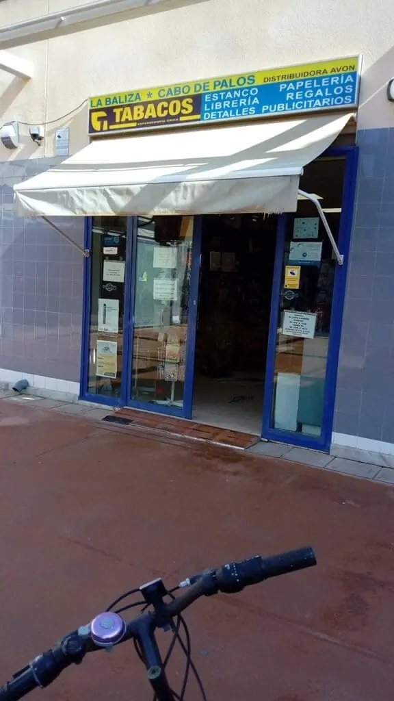 Counter at Estanco Cabo de Palos with tobacco and newspapers