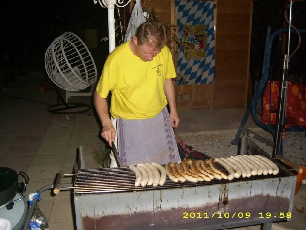 Mixed grill of German sausages prepared at Hans Bar