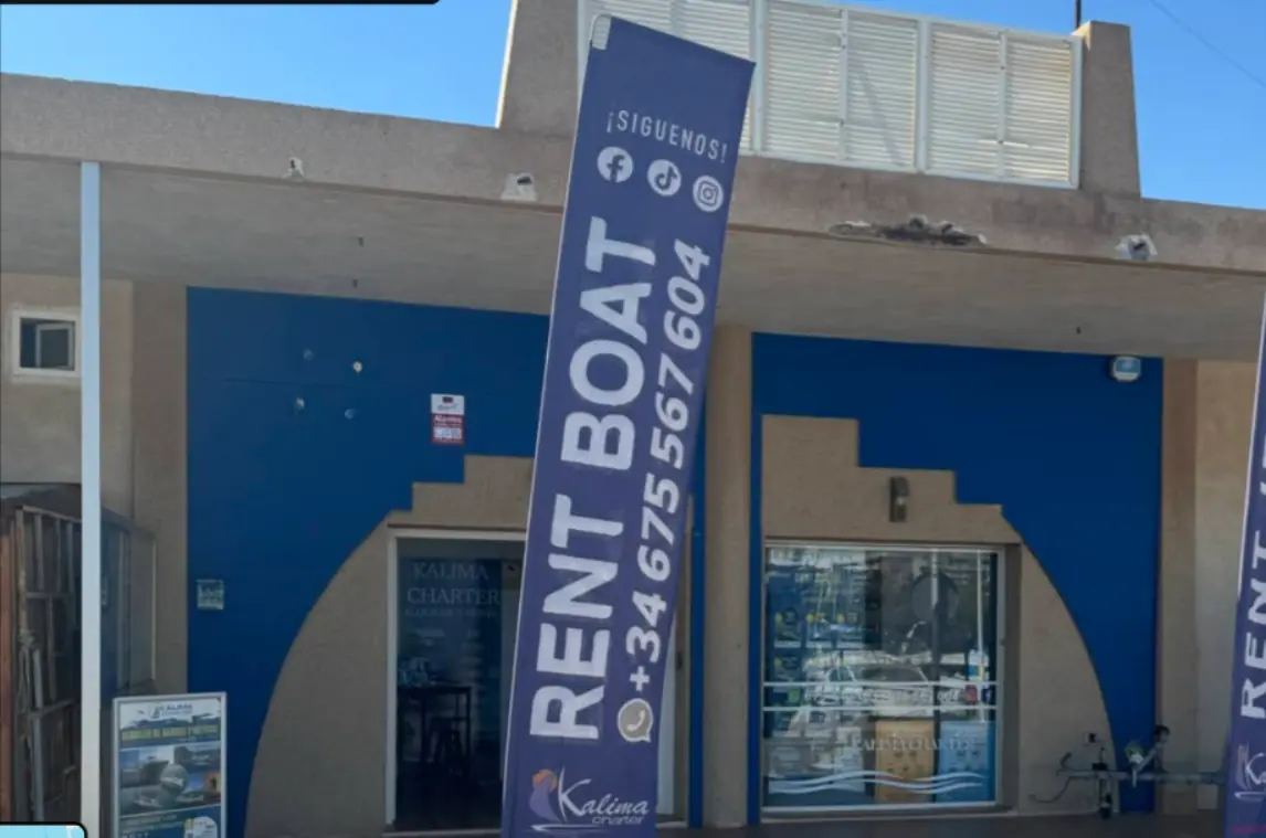 Kalima Charter office with the Rent Boat hire banner