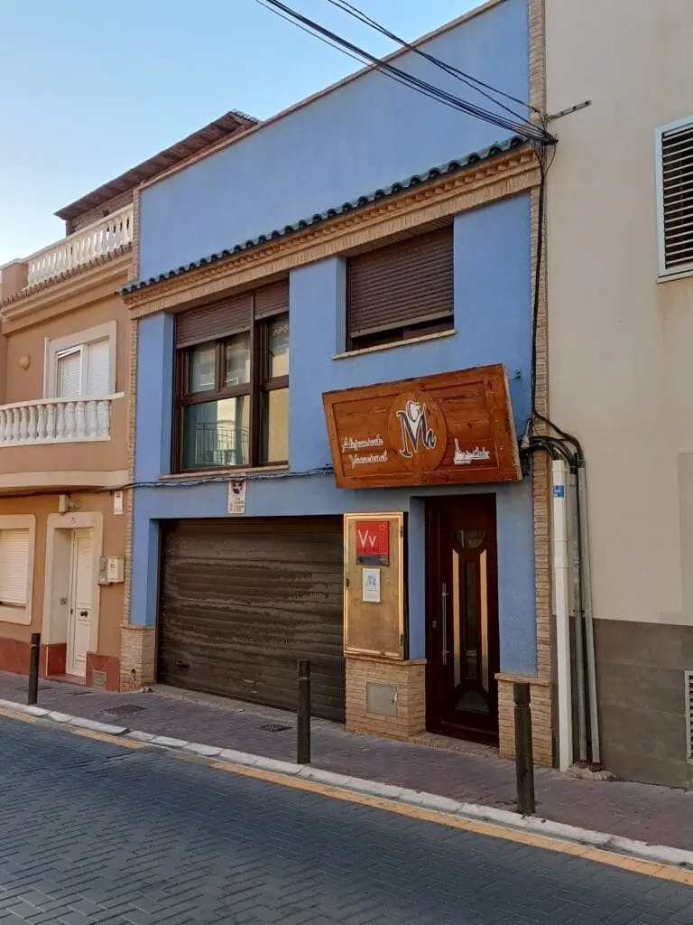 Blue façade of La Casita Azul on Calle Marín, Cabo de Palos