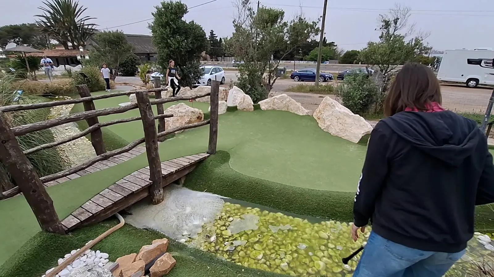 Family playing mini golf at La Manga Adventure Golf