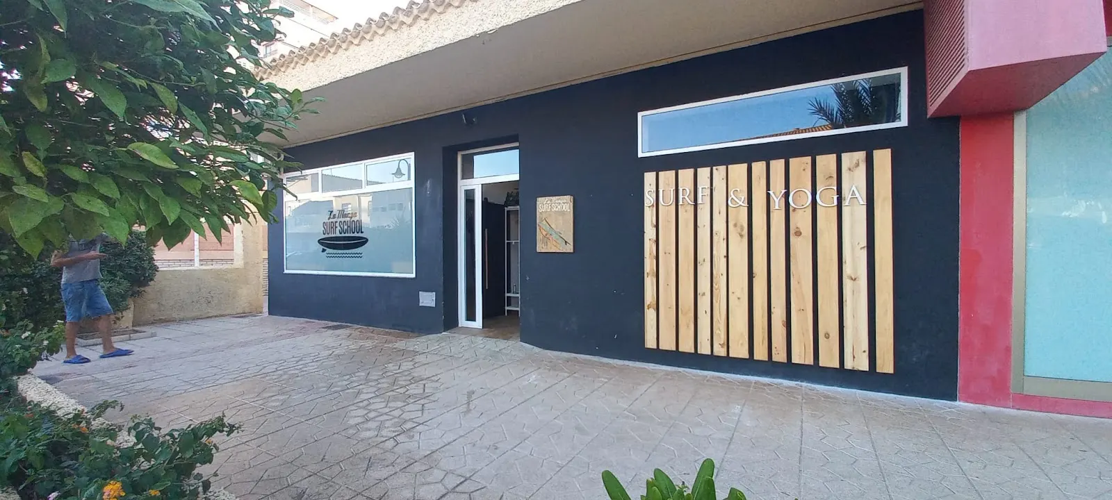 Aerial yoga studio at La Manga Surf School in Plaza Bohemia