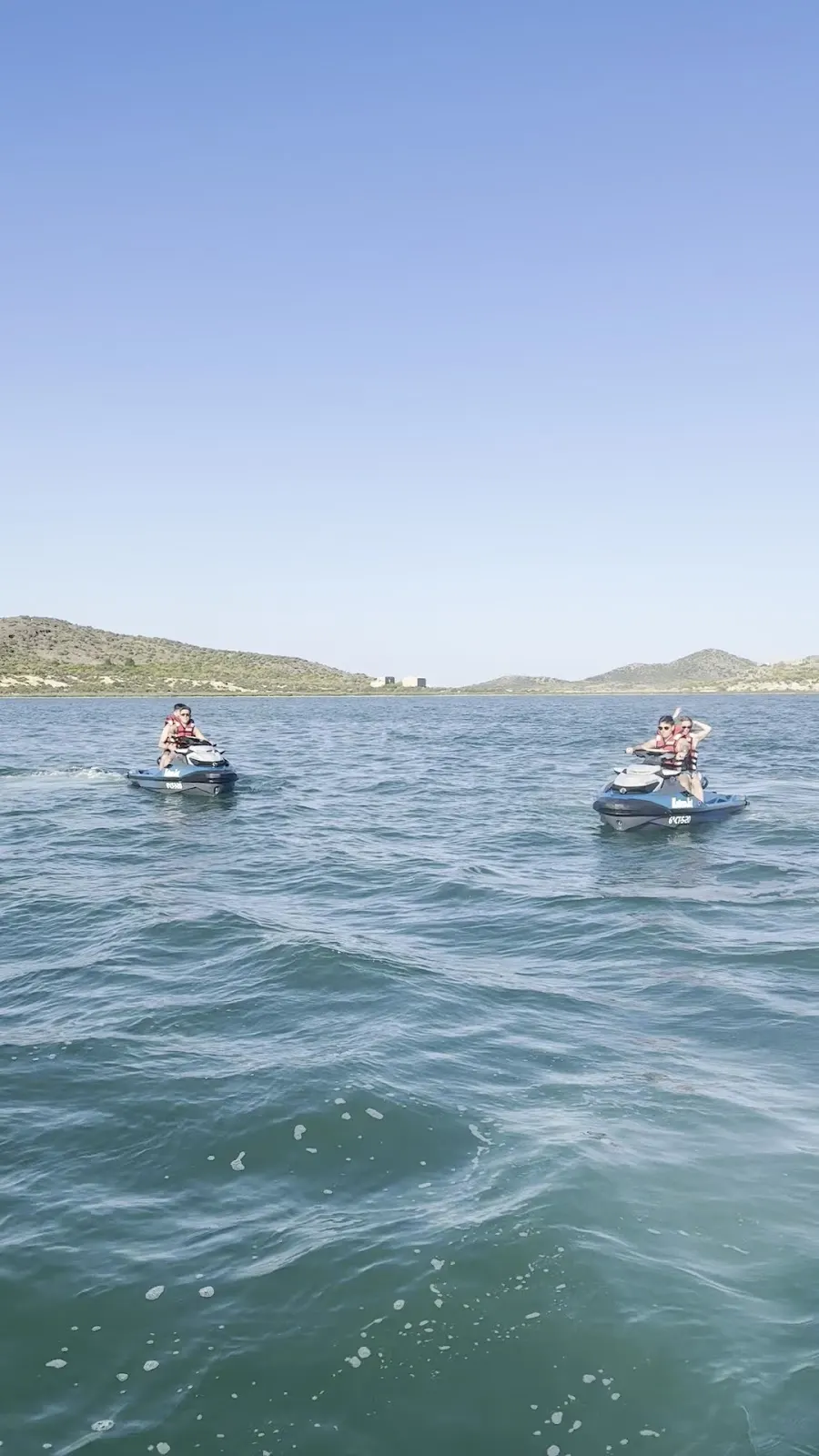 Two Mediterráneo Jet jet skis travelling along the coast