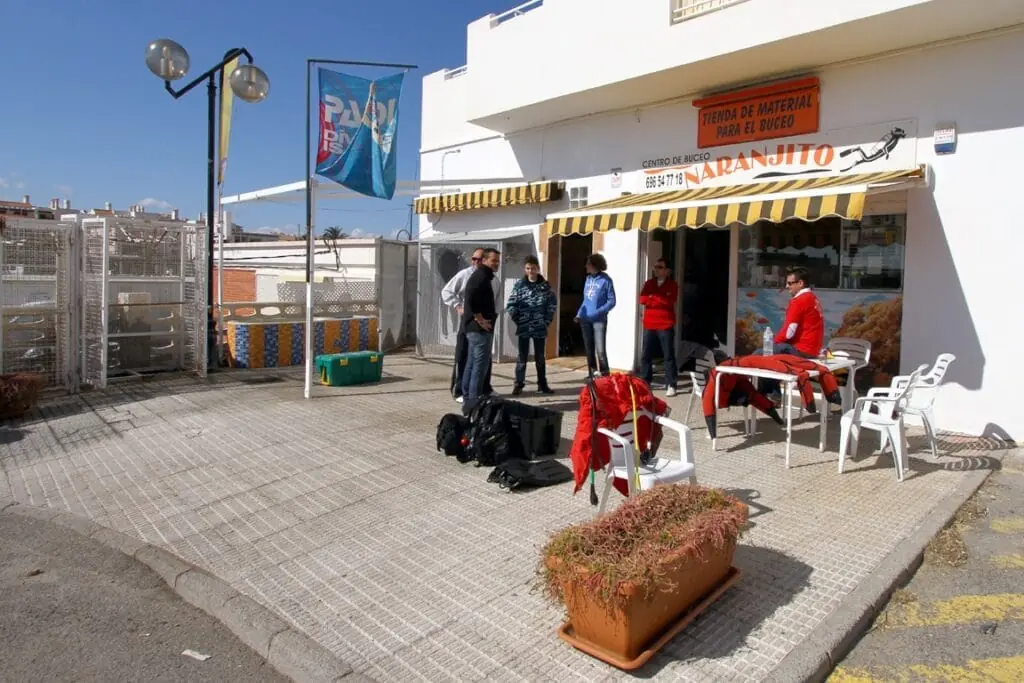 Front of Naranjito dive centre, with customers preparing their equipment