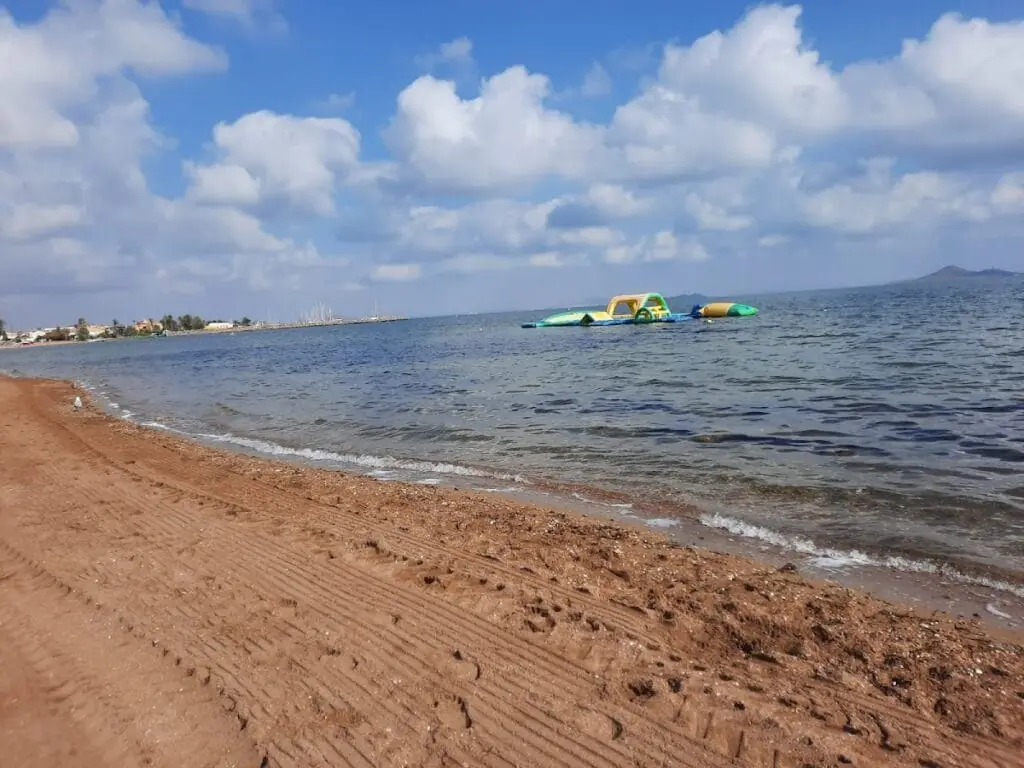 Shore of Mar de Cristal with inflatable water attractions on the Mar Menor