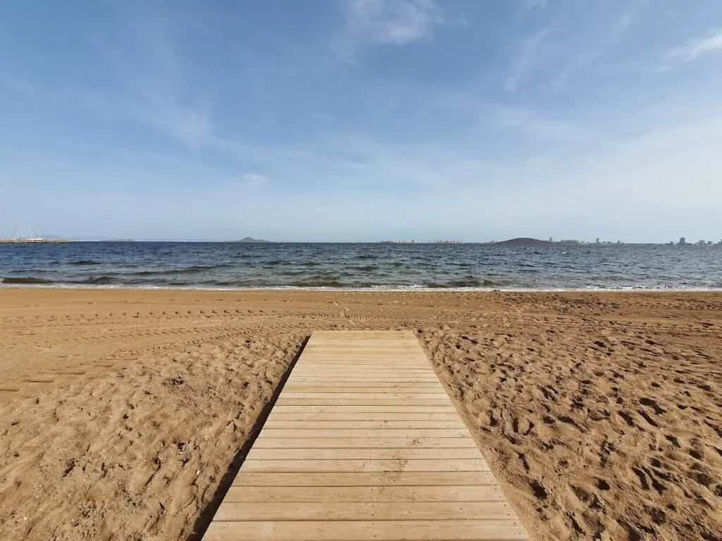 Wooden walkway over the sand towards the Mar Menor, in Mar de Cristal