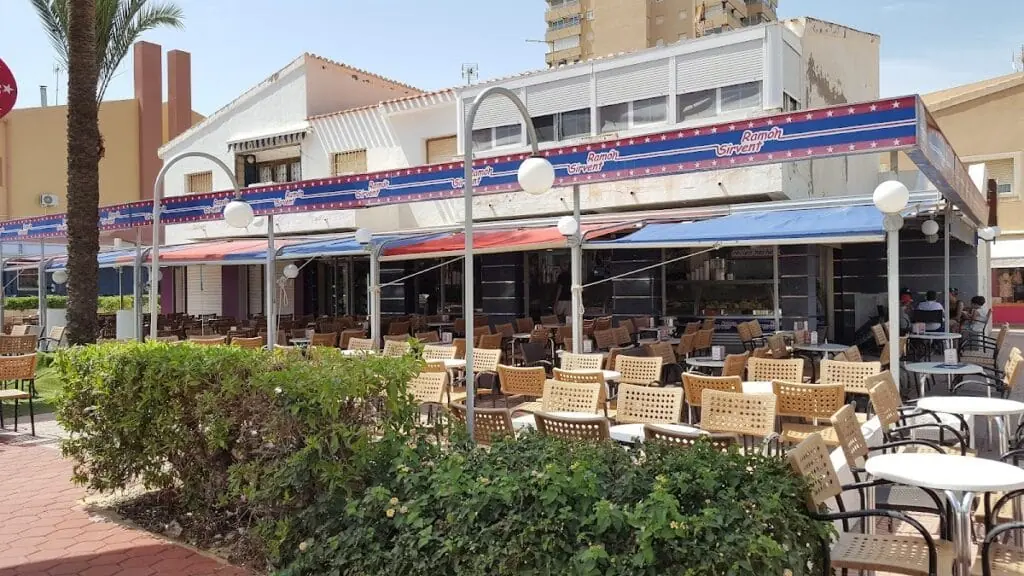 Exterior of Ramón Sirvent ice cream parlour on Plaza Bohemia, with its terraces