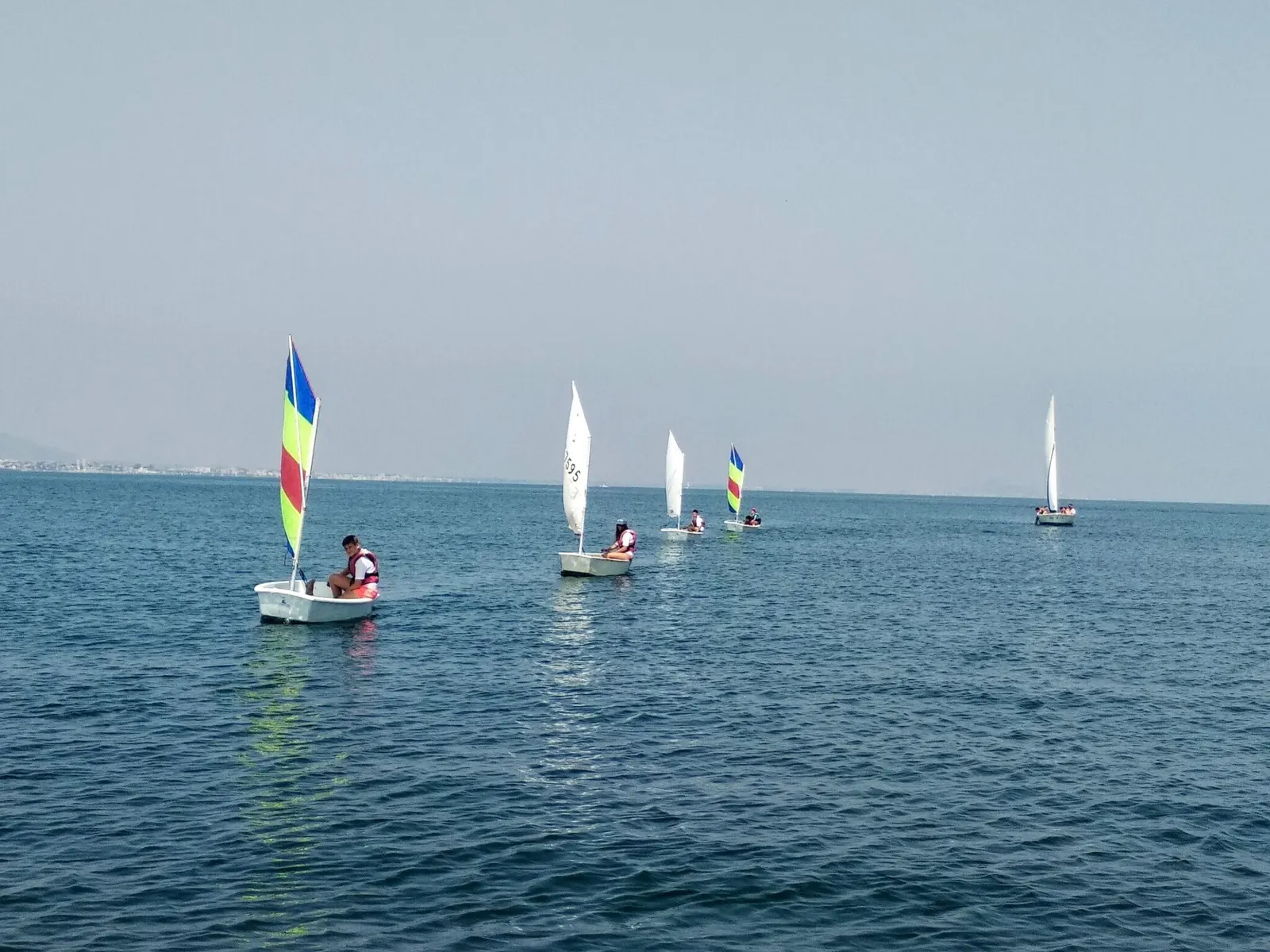 Optimist with Tatowind Sailing School students sailing on the Mar Menor